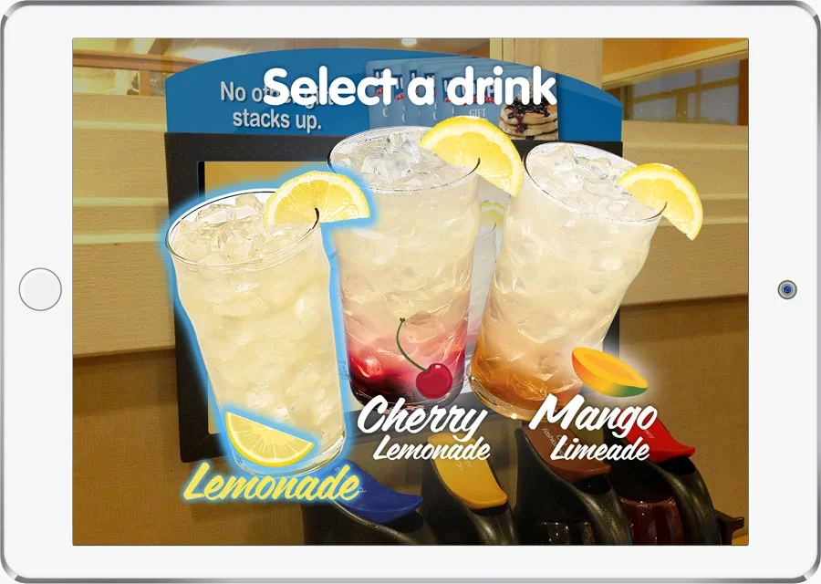 iPad game: select a drink, Lemonade, Cherry Lemonade or Mango Limeade, over the live camera view