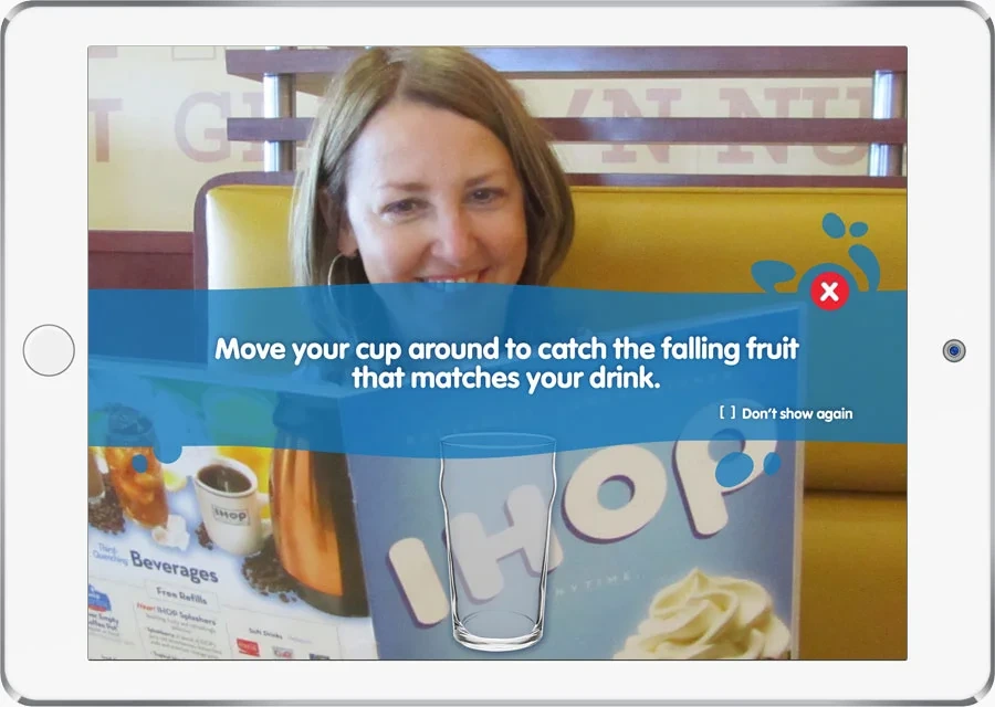 iPad game instructions: move your cup to catch the falling fruit that matches your drink