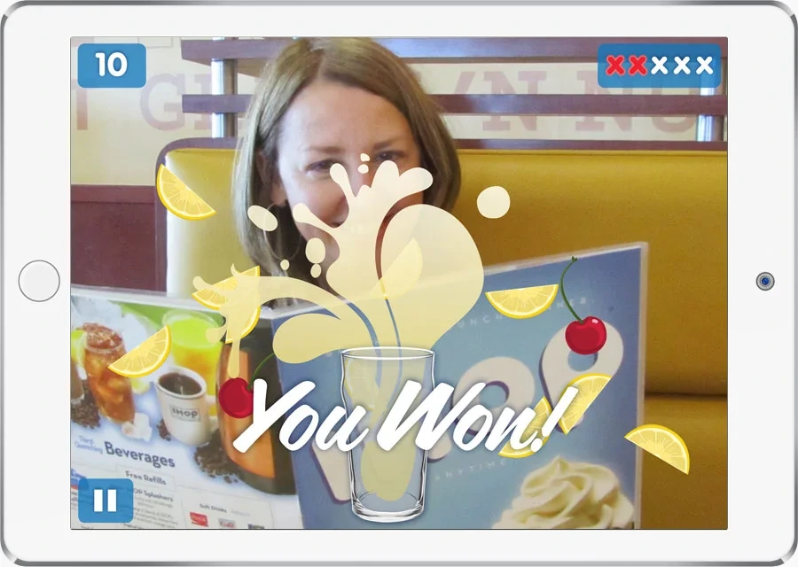 iPad game: "You Won!" with a lemonade splash