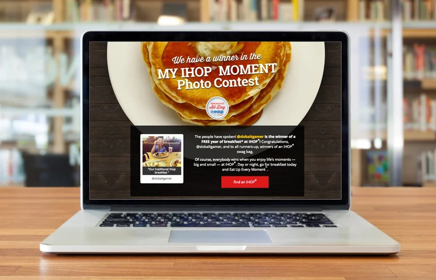 Contest winners page, phase 3, on a laptop