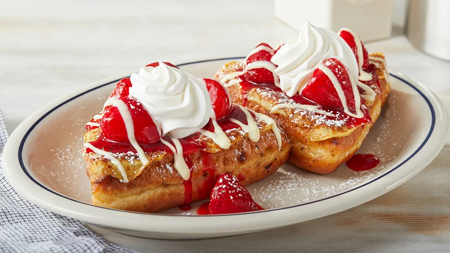 Strawberry stuffed French toast with whipped cream
